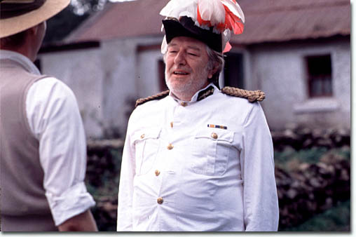 Michael Gambon as Father Jack and Rhys Ifans as Gerry Evans